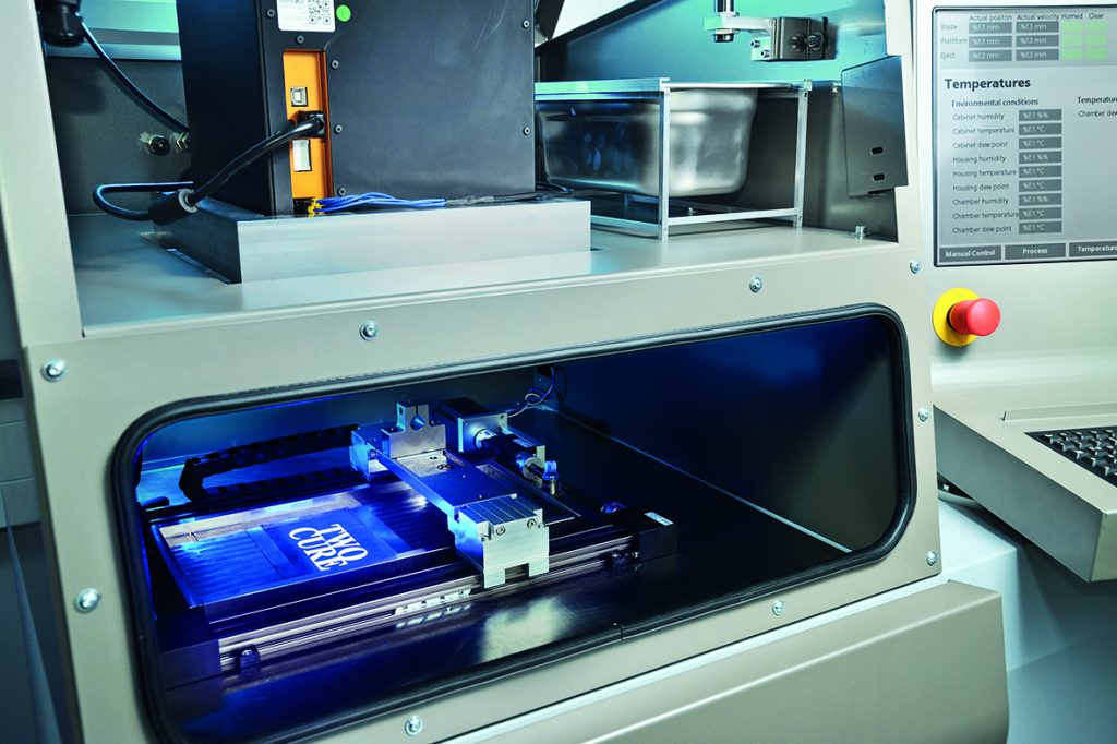 Inside the prototype TwoCure 3D printer. Photo via Fraunhofer ILT