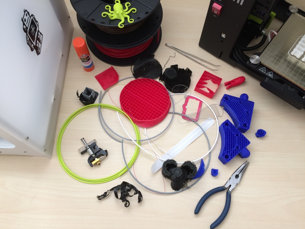 Sample parts from the Crowdsourcing Waste PLA Recycling Challenge. Photo via Print Your Mind 3D