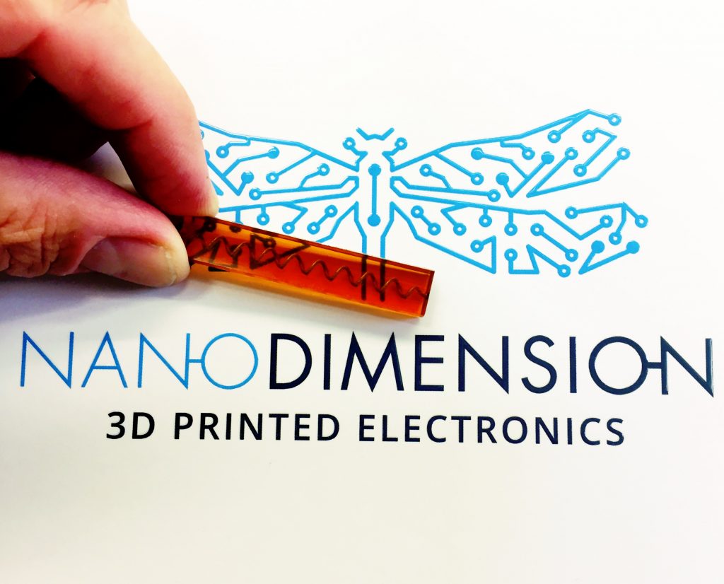 3D printed conductive spiral within a non-planar component. Photo via Nano Dimension