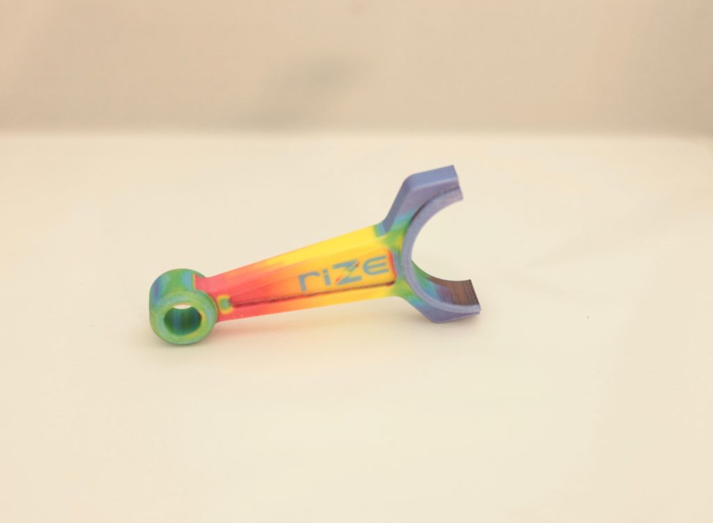 Sample full color 3D printed part from the XRIZE. Photo via RIZE