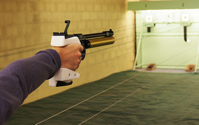 Testing the 3D printed pistol grip. Photo via Zortrax.