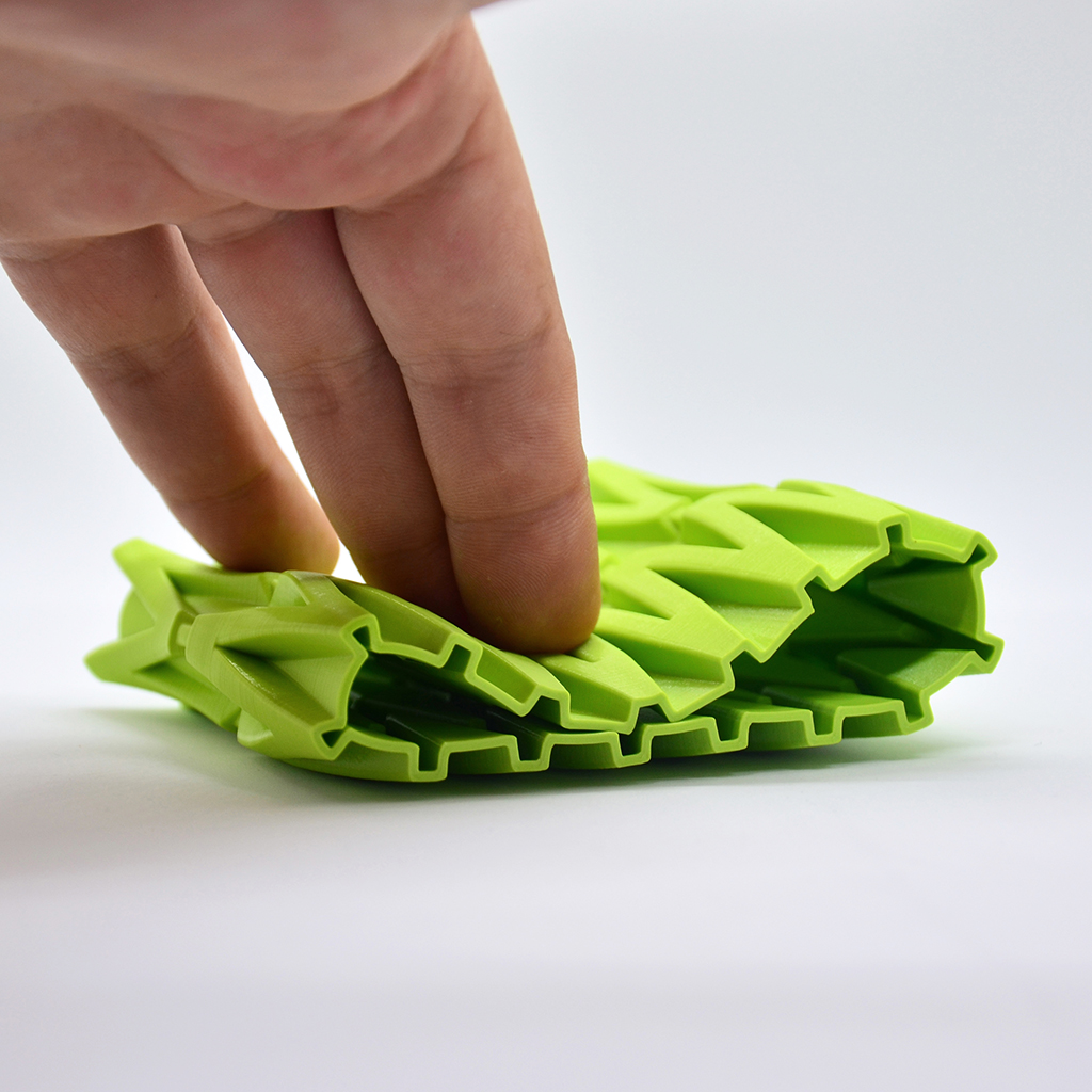 Demonstrating the flexibility of Fillamentum Pistachio Green. Model printed by A. Nosek on Trilab Deltiq, designed by IanB. Photo via Fillamentum