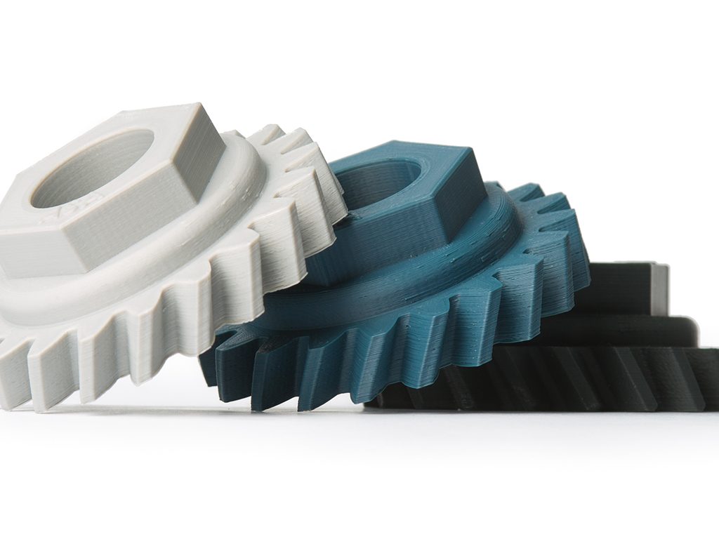 Stack of ASA Extrafill 3D printed gears. Photo via Fillamentum