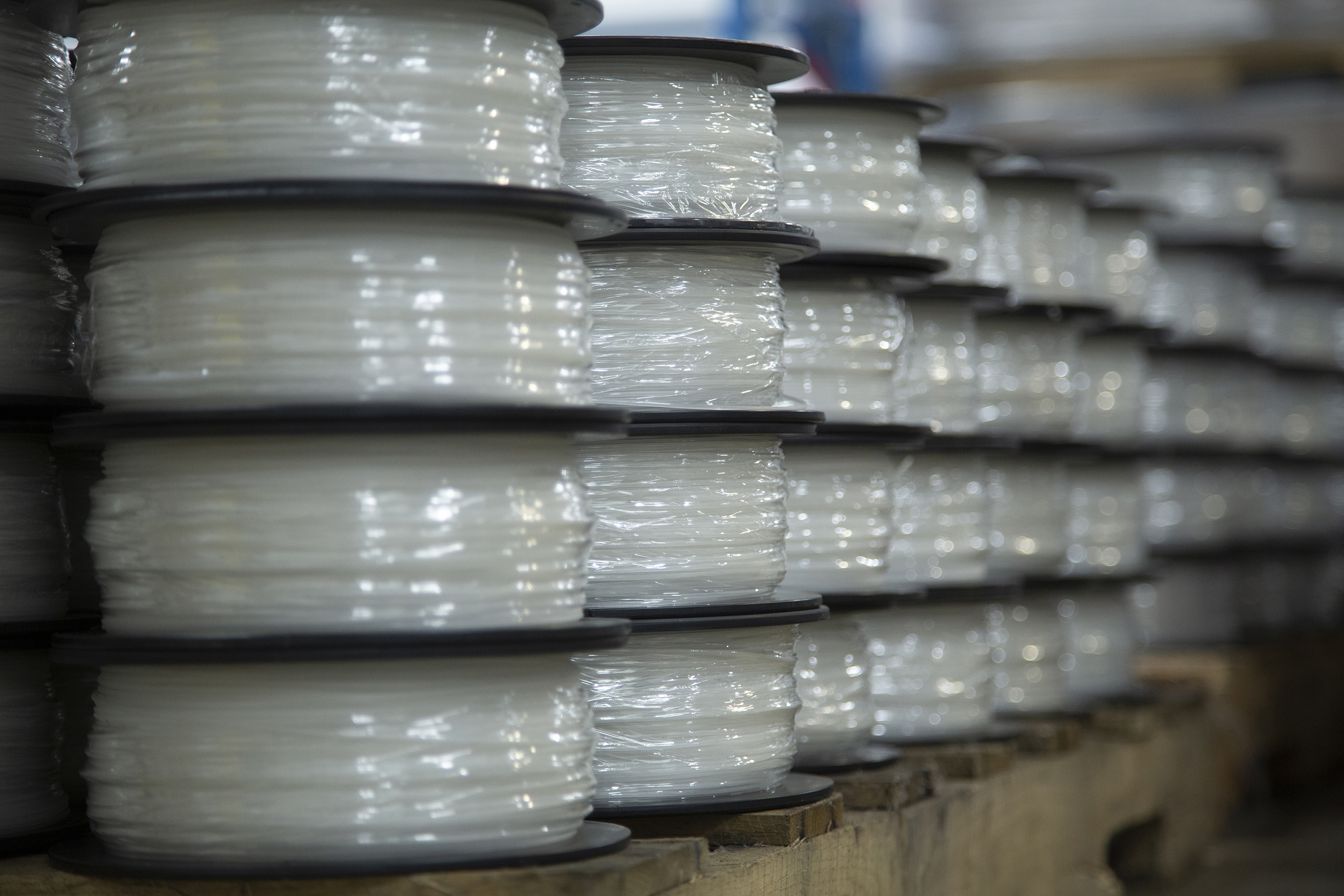 Pallets of Jabil Engineered Material in filament form are prepared for shipment to Jabil customers and distribution partners. Photo via Jabil.