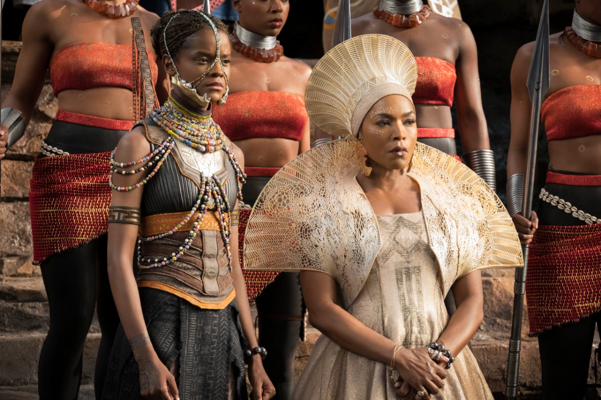 3D-printed mantel and crown worn by the character of Queen Ramonda. Image via Marvel's Black Panther/ Costume Design by Ruth Carter