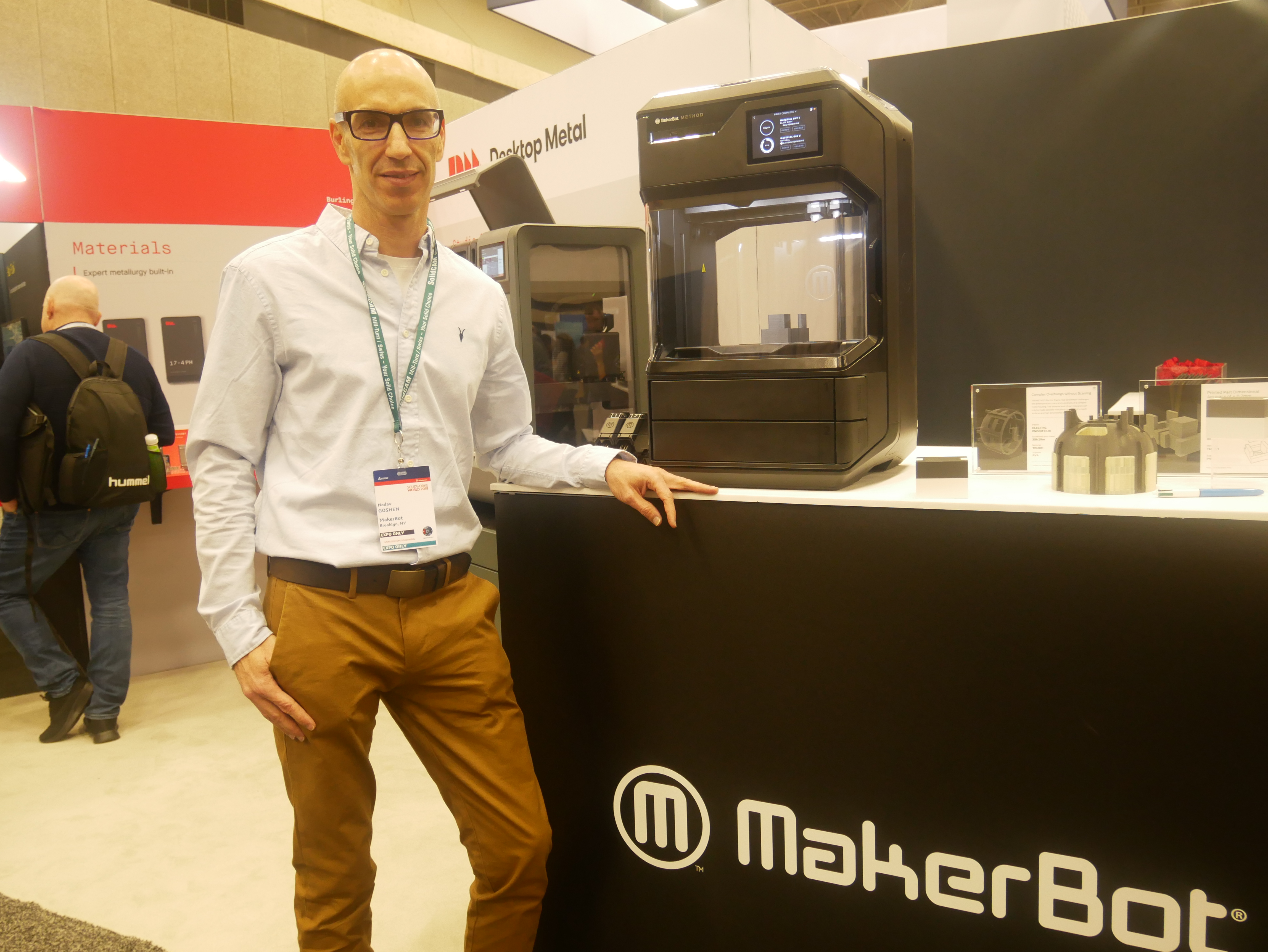 Nadav Goshen, CEO and President of Makerbot next to the Method 3D printer. Photo by Tia Vialva.