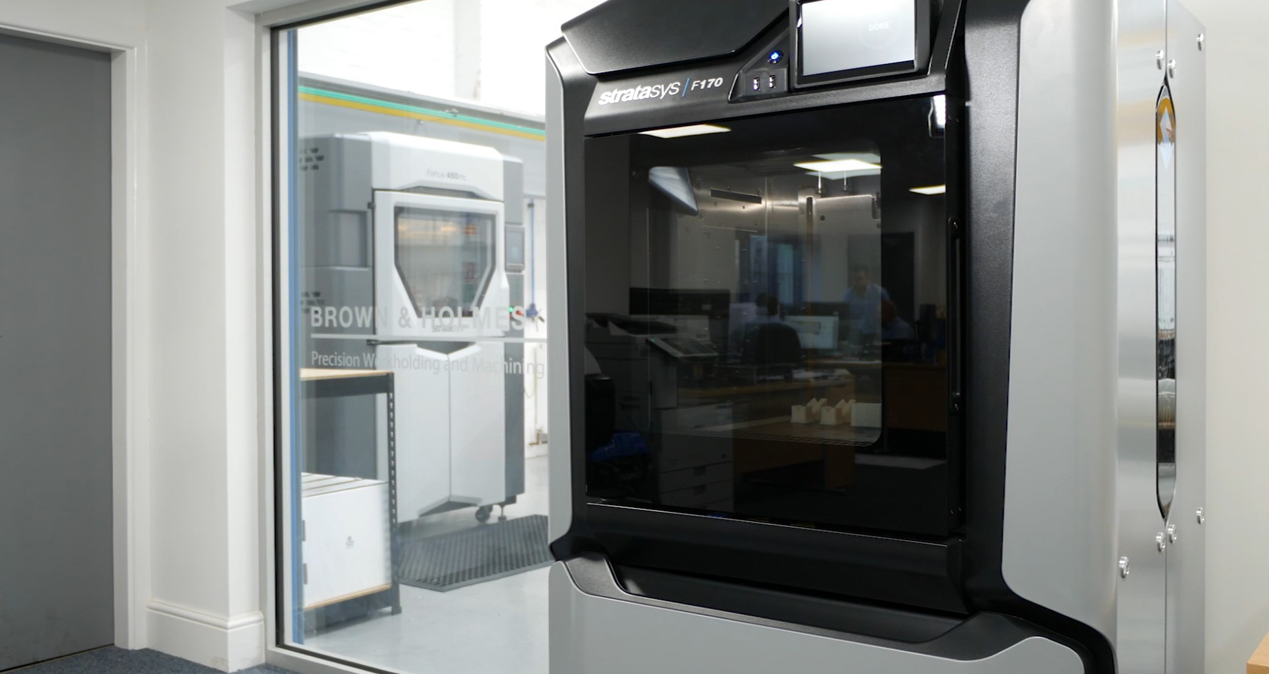 The Stratasys F170 and Fortus 450mc installed on the shop floor at Brown & Holmes. Photo via SYS Systems.