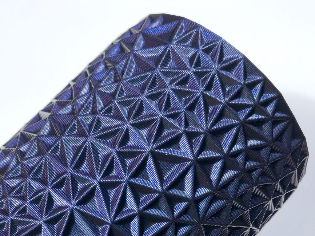 Objects 3D printed in Wizard’s Voodoo PLA Extrafill sparkle between violet and blue. Polygon vase design by Antonin Nosek. Photo via Fillamentum