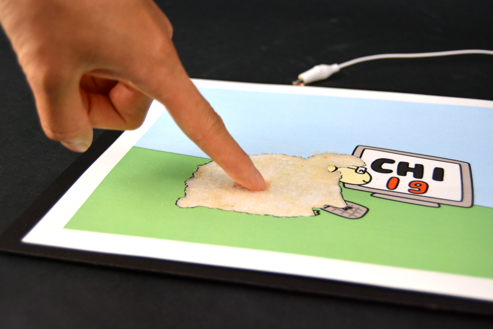An interactive mousepad with electrospun plastic. Photo via CMU/Michael Rivera.