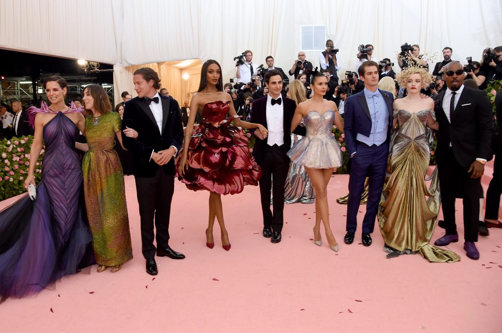 From left to right: Jamie Foxx, Andrew Garfield, Jourdan Dunn, Julia Garner, Nina Dobrev, Vito Schnabel, Gia Coppola, Katie Holmes and Zac Posen attend The 2019 Met Gala Celebrating Camp: Notes on Fashion at Metropolitan Museum of Art on May 06, 2019 in New York City, sporting Posen's 3D printed fashions. Photo by Jamie McCarthy/Getty Images