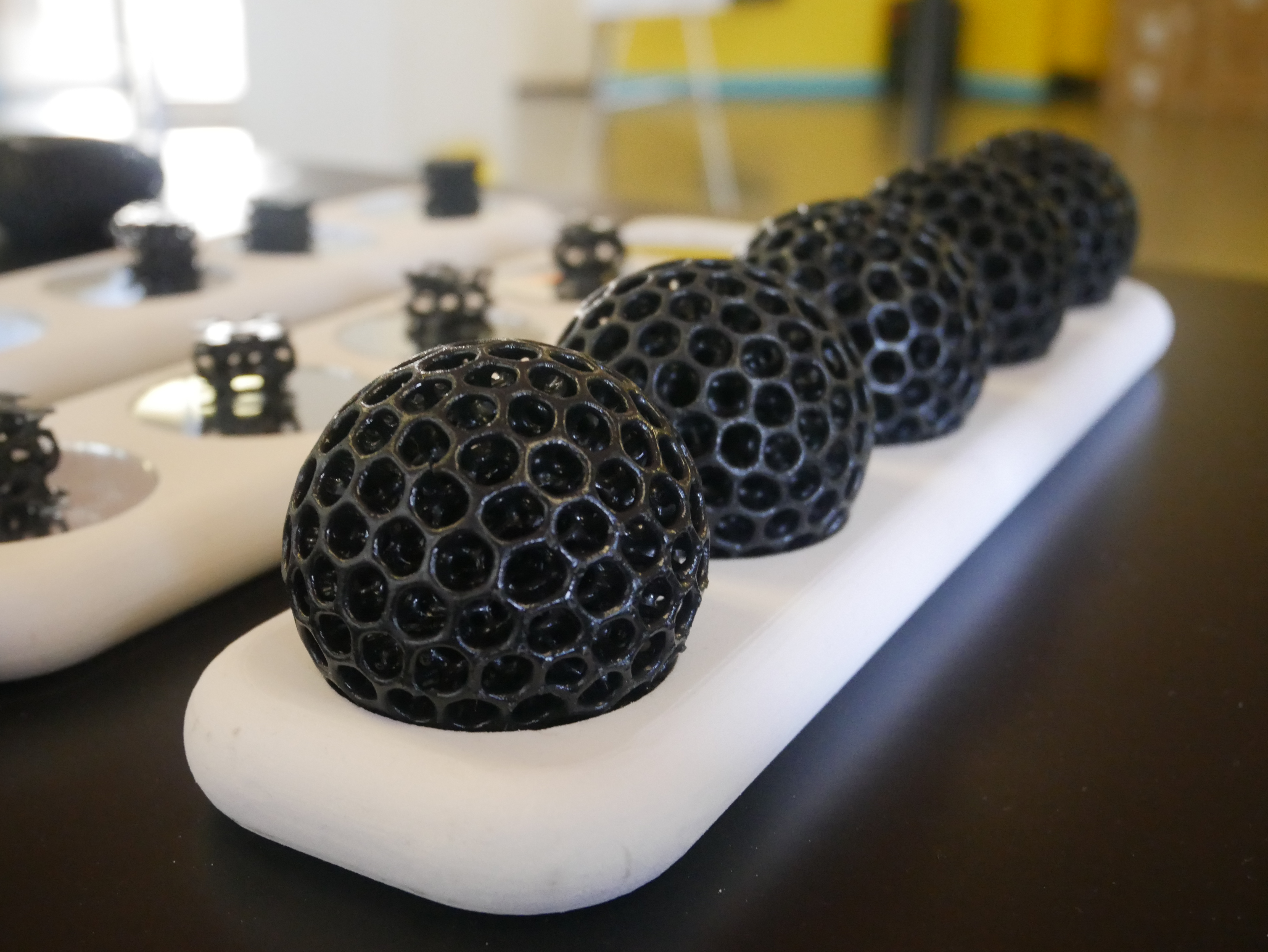3D printed balls created from the newly developed New Balance Formlabs resin. photo by Tia Vialva.