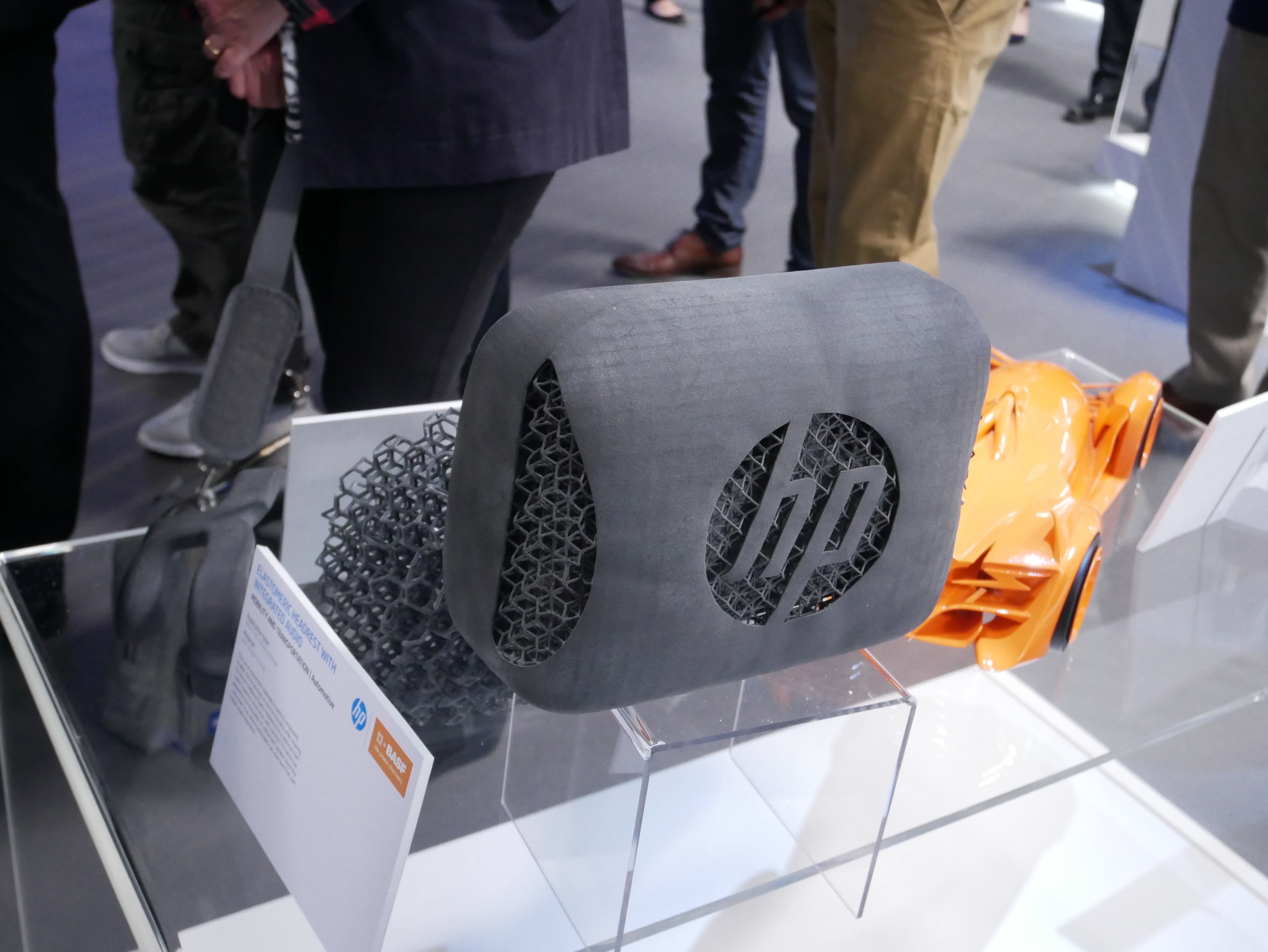 An elastomeric headrest with an integrated Bluetooth speaker has been conceptualized with TPU lattice structures. This seating component was 3d printed on the HP 5200. Photo by Tia Vialva. 