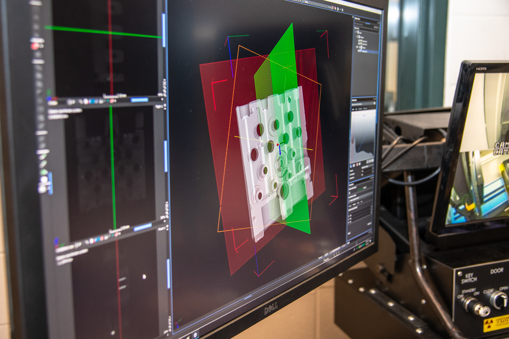 3D rendering of an antilock braking system imaged by the X-ray CT system. Red and green planes represent slices and sections from different viewpoints used to observes the part's internal structure. Photo via Auburn University