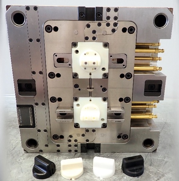 3D printed inserts inside a metal component. Photo via Kunststoff-Institut.