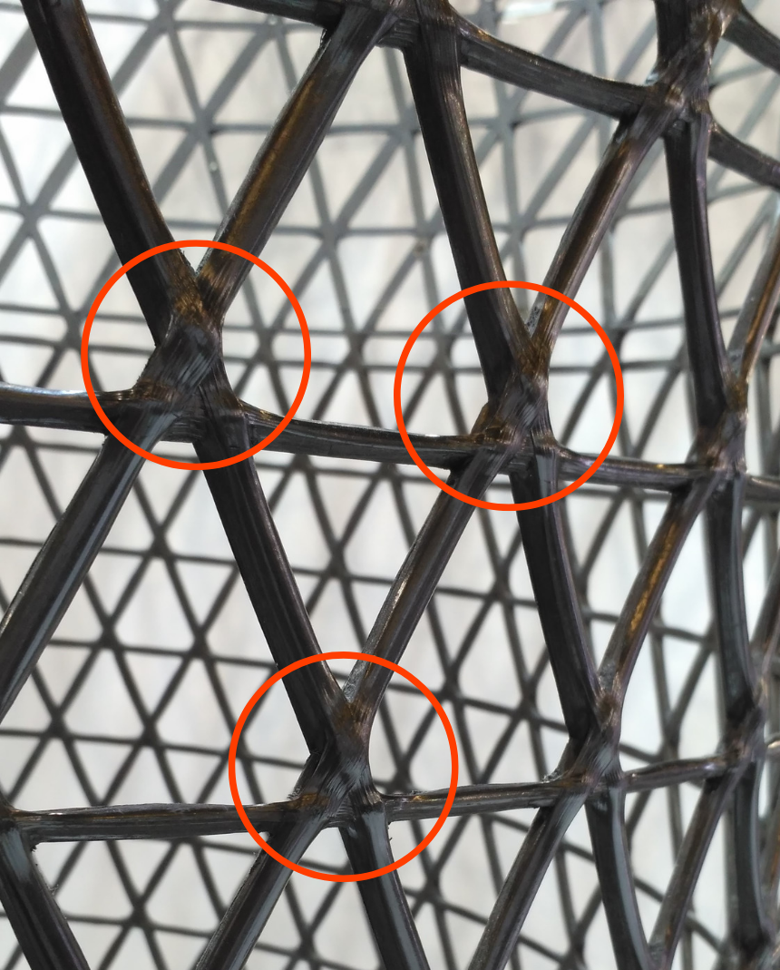 A prepreg-based lattice showing the rise in thickness in the places of intersections. Photo via Anisoprint.