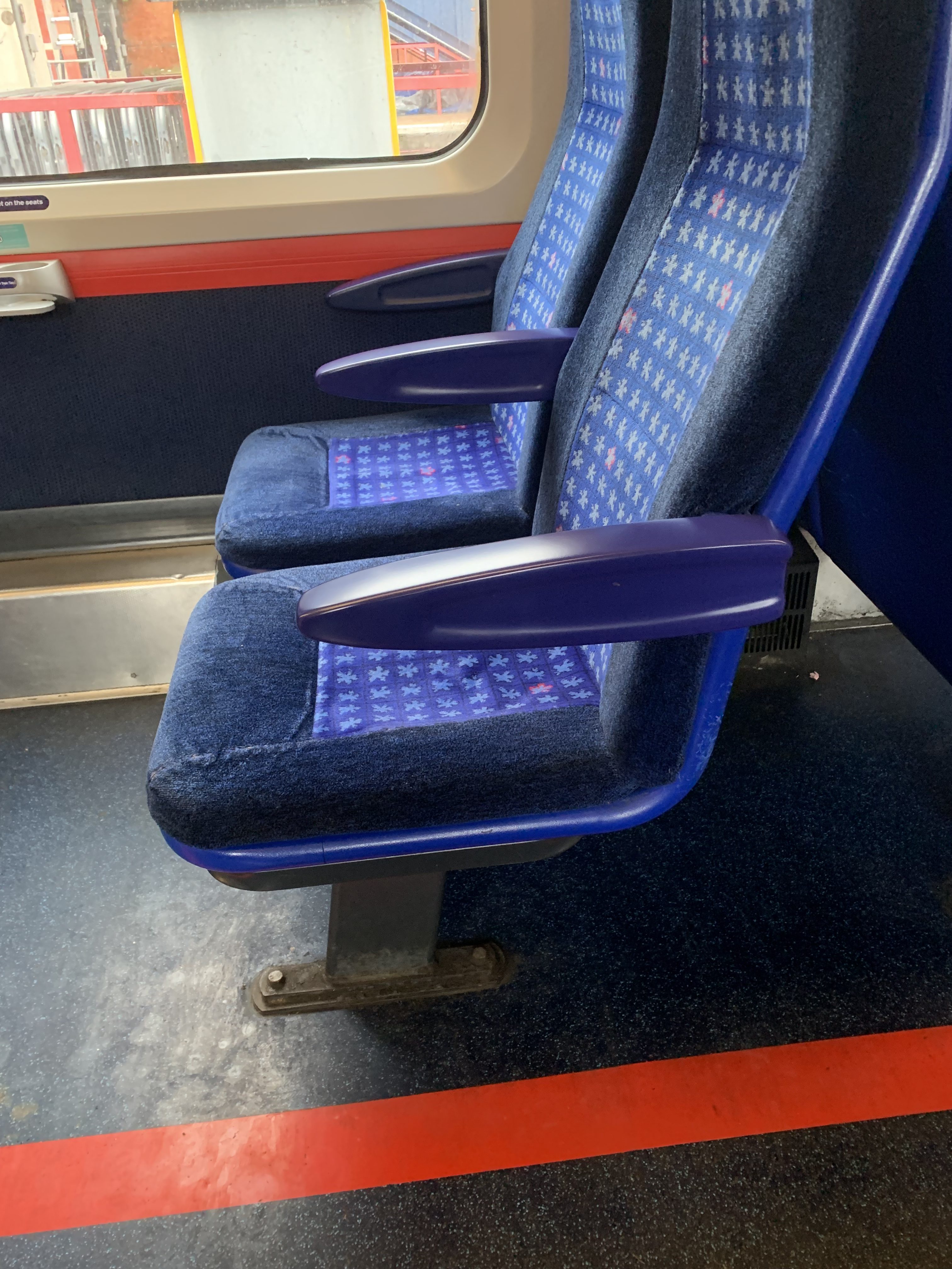 3D printed armrests on Chiltern Railways trains. Photo via Stratasys.