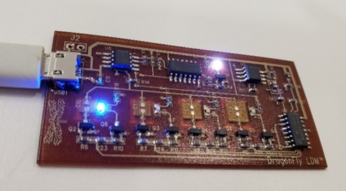 3D printed capacitors on a PCB. Photo via Nano Dimension.