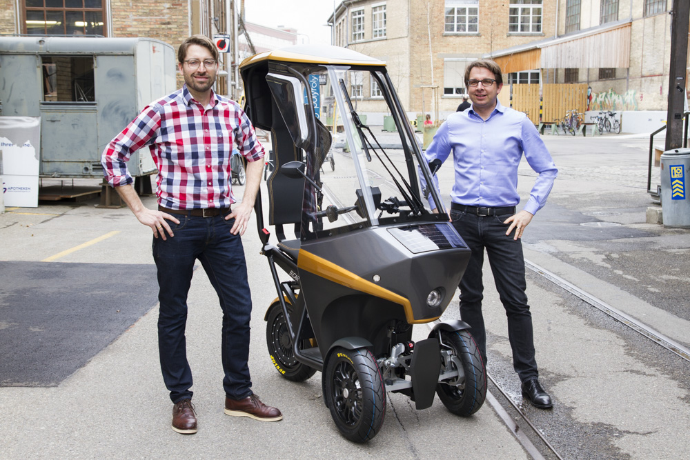 The BICAR together with its two inventors, Hans-Jörg Dennig (left) and Adrian Burri (right). Photo via Share your BICAR AG.