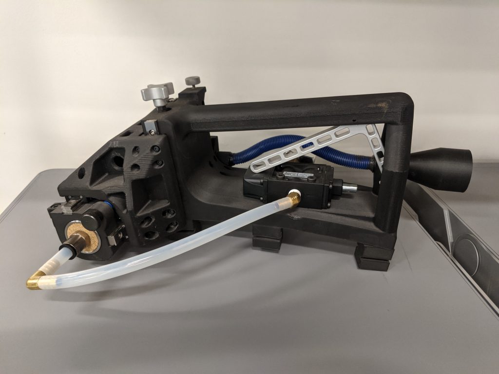 A track-based cutting tool designed at the center and printed on Markforged printers for Siemens Oil and Gas service use. Photo by Dayton Horvath for 3D Printing Industry
