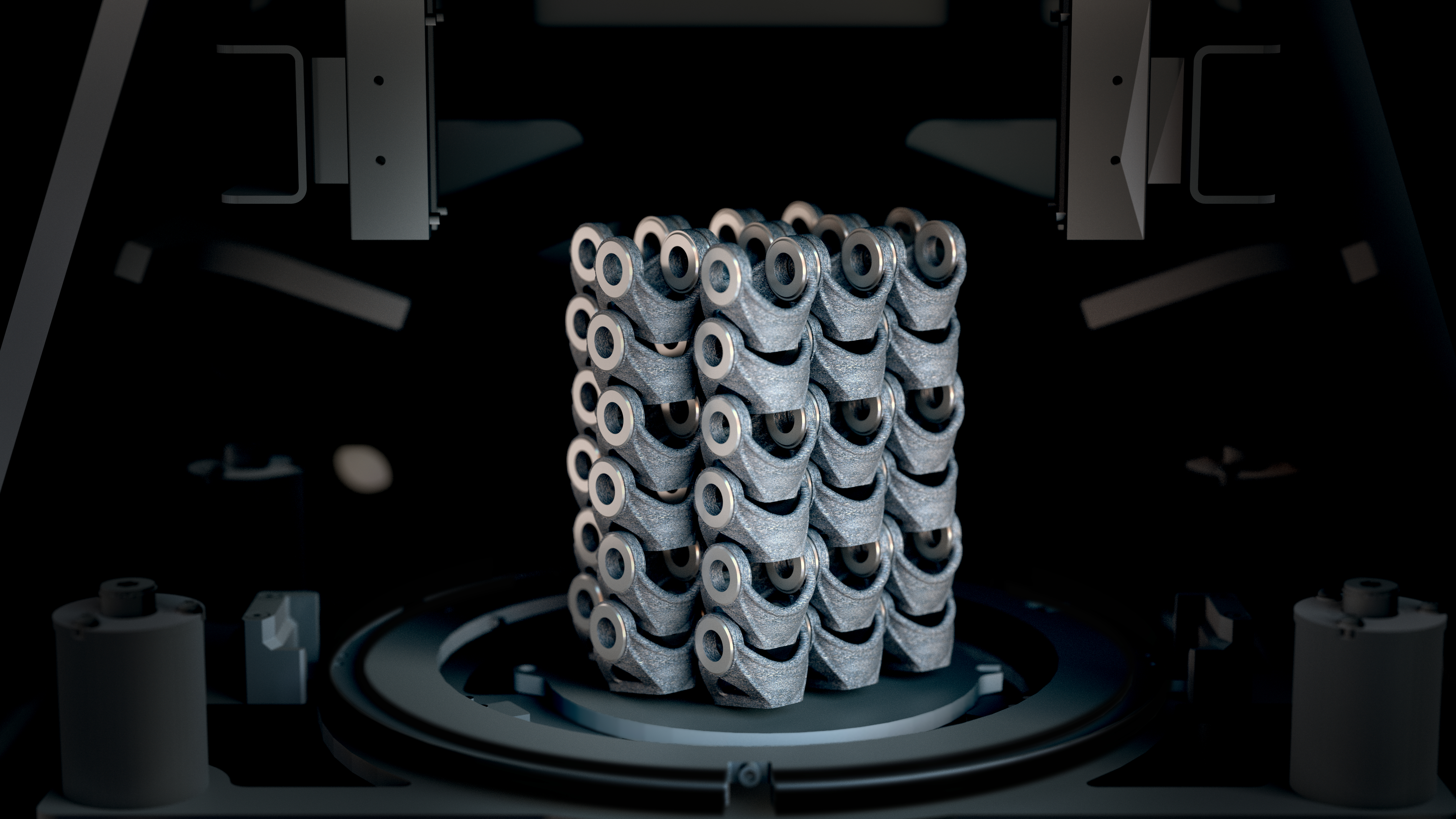 A batch of 3D printed brackets made on the Arcam EBM Spectra L. Photo via GE Additive.