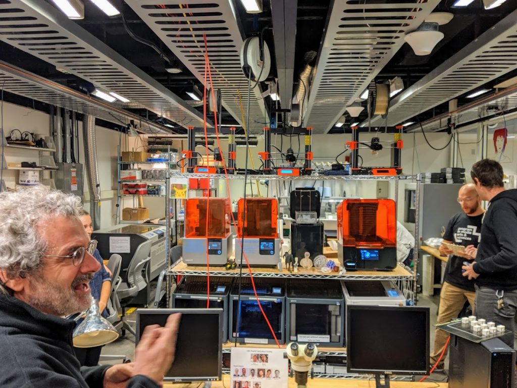 Neil Gershenfeld at MIT's Center for Bits and Atoms and several Formlabs 3D printers. Photo by Michael Petch.