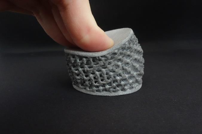 voxeljet greyscale 3D printed part with variable target properties. Photo via voxeljet.
