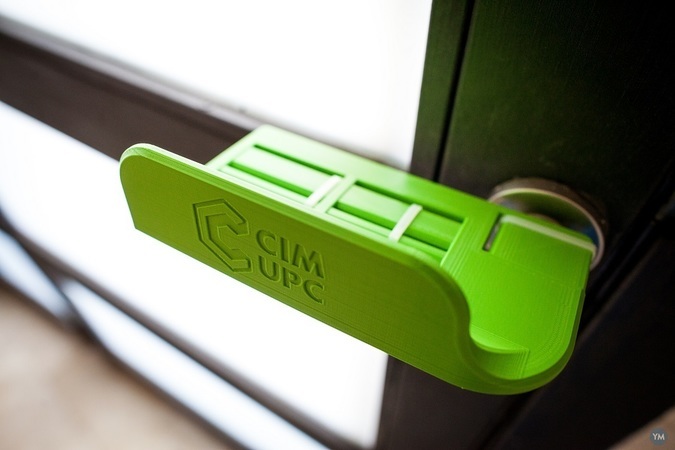 CIM UPC hands-free 3D printed door handle opener.