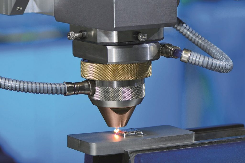 Laser material deposition processing head. Photo via Fraunhofer ILT.