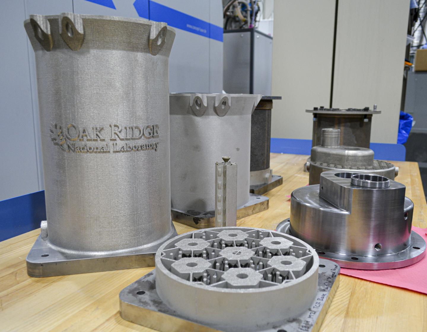 3D printed components for the prototype reactor. Photo via Britanny Cramer/ORNL/US Dept. of Energy.