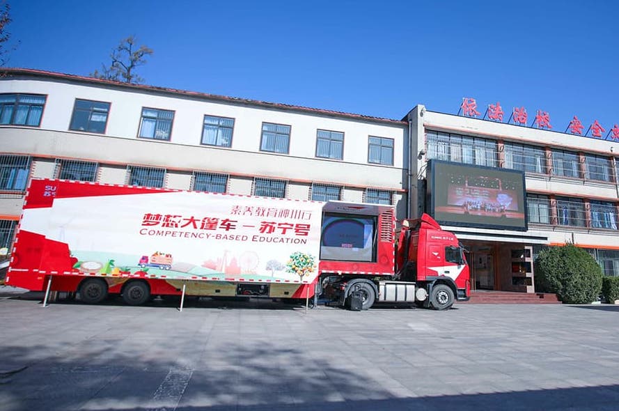 Materialise's Dream Bus has brought 3D printing to school children in 25 Chinese provinces. Photo via Materialise.