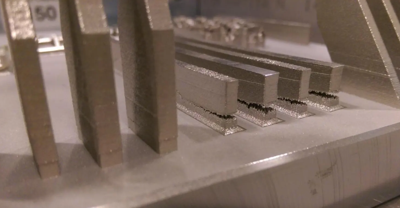 Catastrophic cracks in metal 3D printed parts. Photo via University of Pittsburgh.