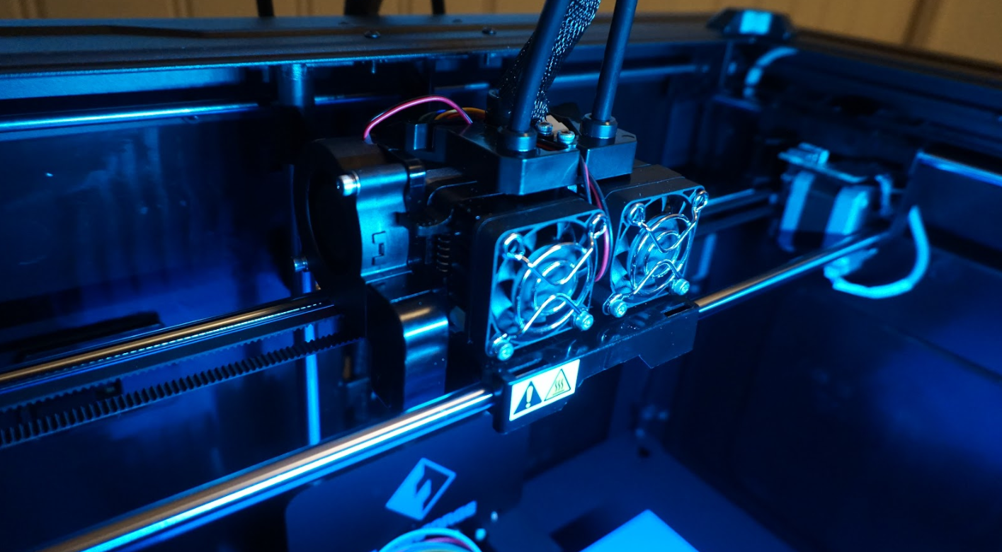 The Creator Max's dual extruder printhead. Photo by 3D Printing Industry.