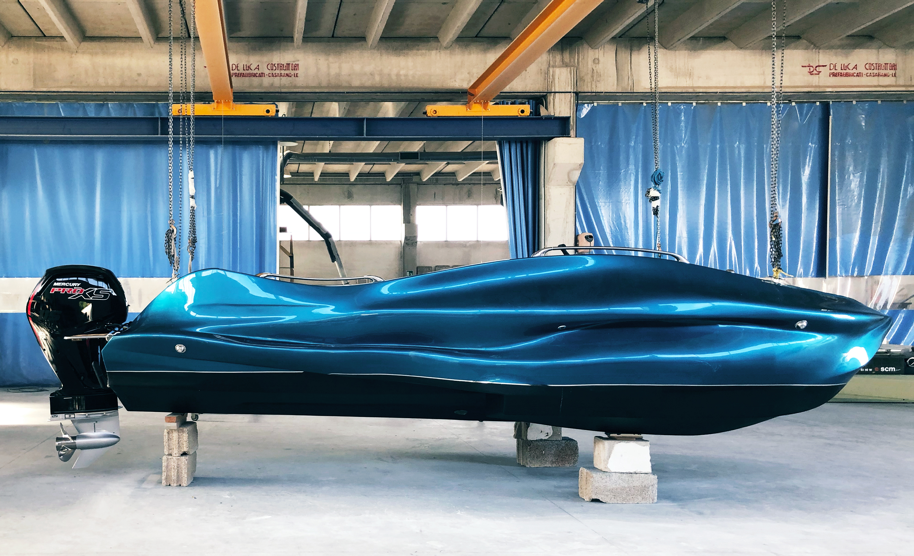 The MAMBO spans 6.5 meters by 2.5 meters and is printed in a continuous fiberglass thermoset material. Image via Moi Composites.