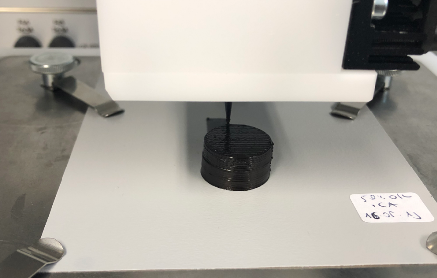 The Freiburg researchers used a DIW 3D printing technique (pictured) to test their novel biomaterial. Image via Lisa Ebers, Freiburg University.