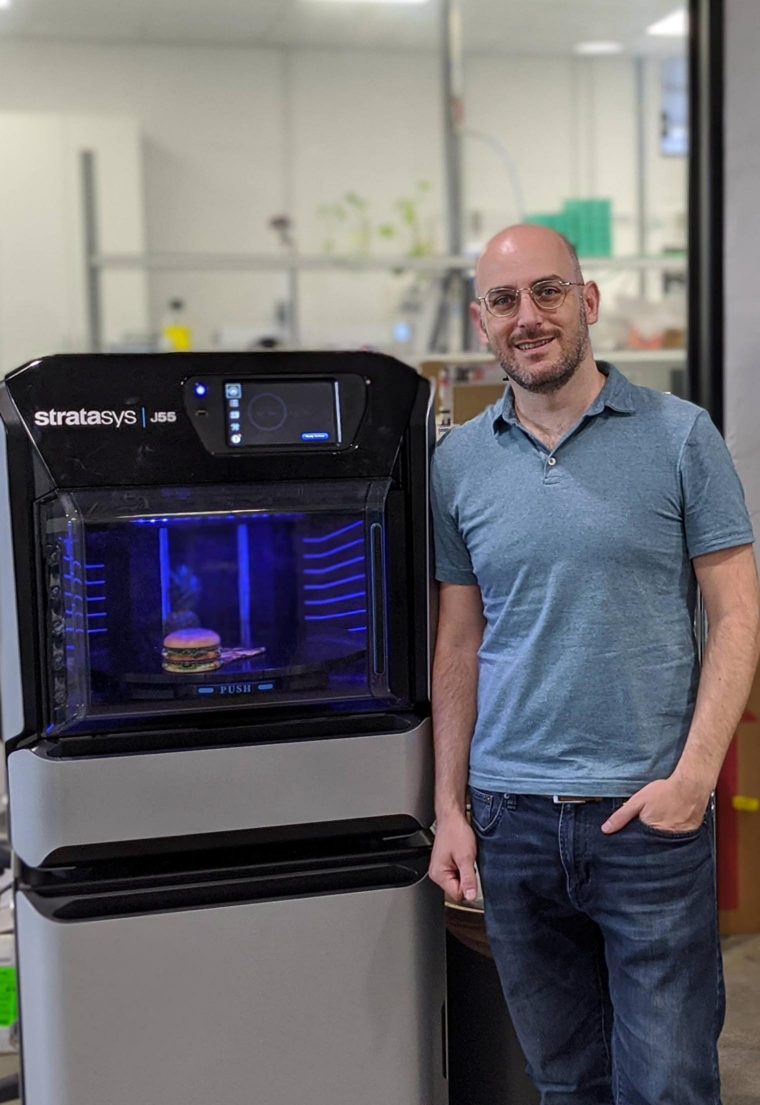 Itay Kurgan, Product Development Manager at Syqe, in front of the company’s new J55 3D Printer