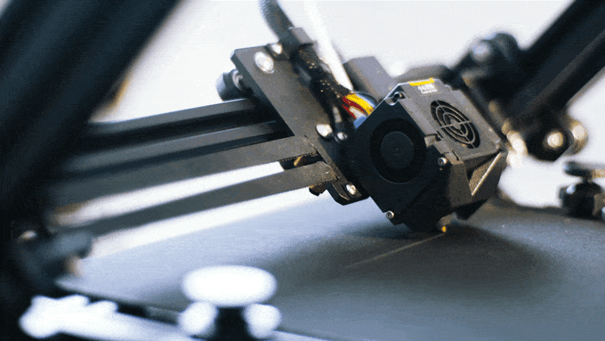 The hotend is angled at 45º in a core-XY motion system. GIF via Creality.