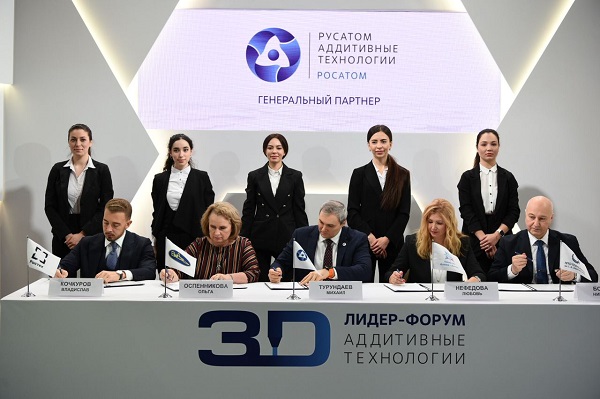 The agreement being signed in early December. Photo via Rosatom.