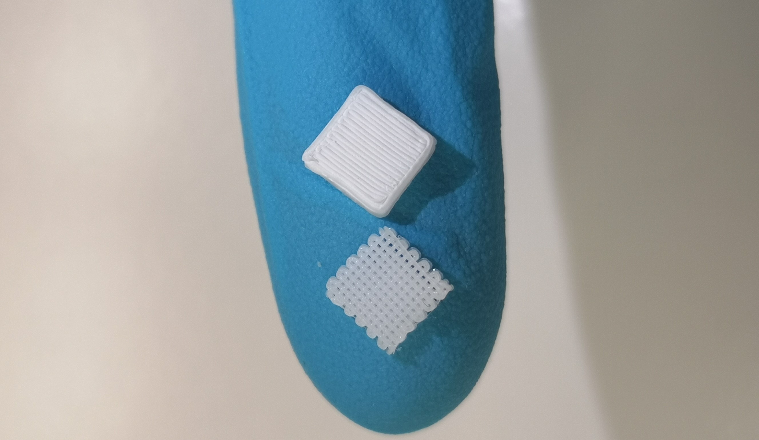 Solid 3D printed oral drug delivery device housing an active liquid ingredient inside. Photo via MLU.