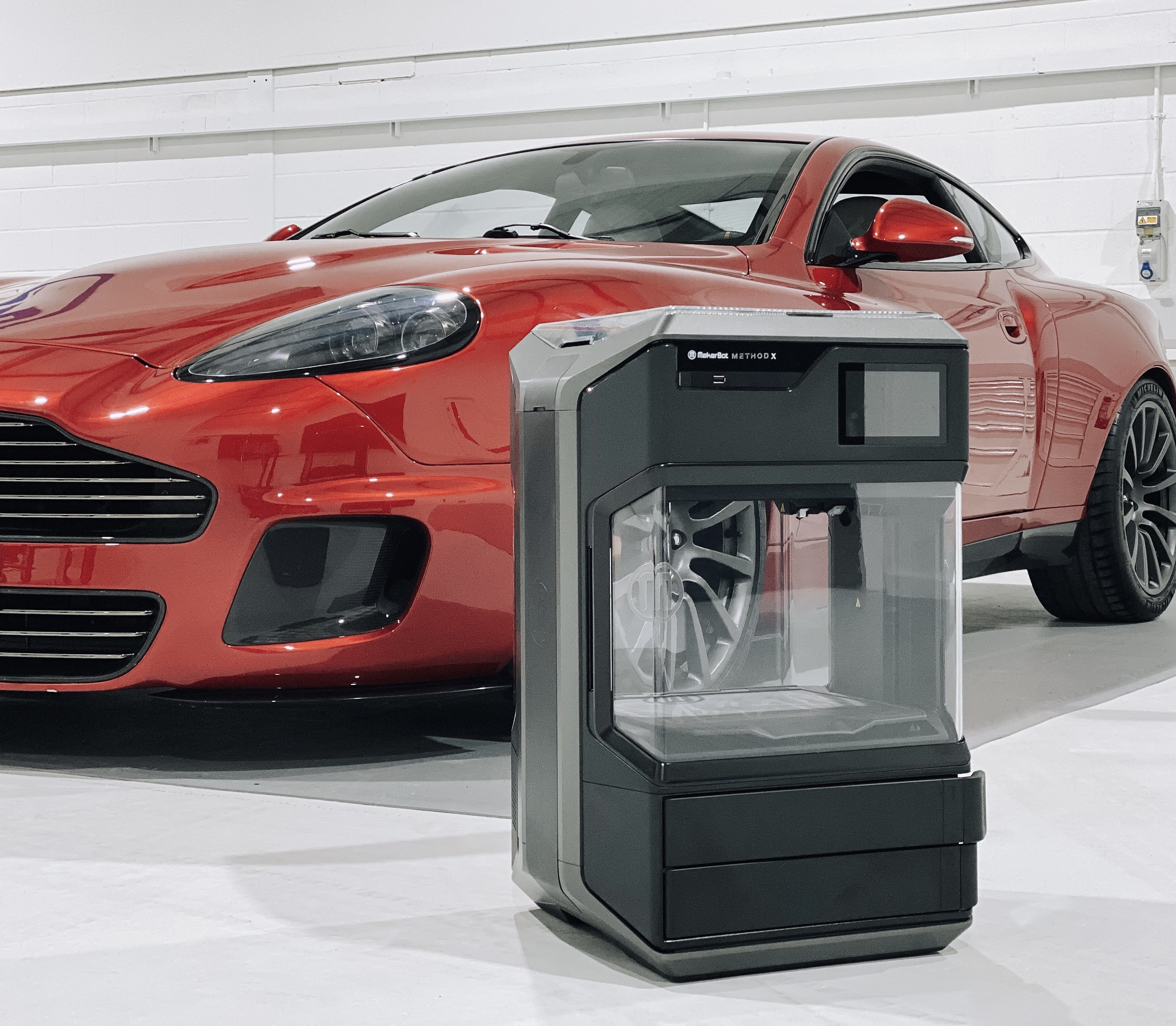 Featured image shows MakerBot's METHOD X 3D printer next to the new R-Reforged Aston Martin CALLUM 25 supercar. Photo via Makerbot.