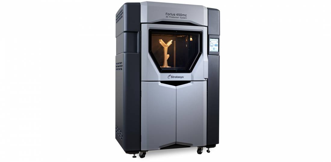 The Stratasys Fortus 450mc features the proprietary heated build chamber, enabling chamber temperatures up to 350°C. Photo via Stratasys.