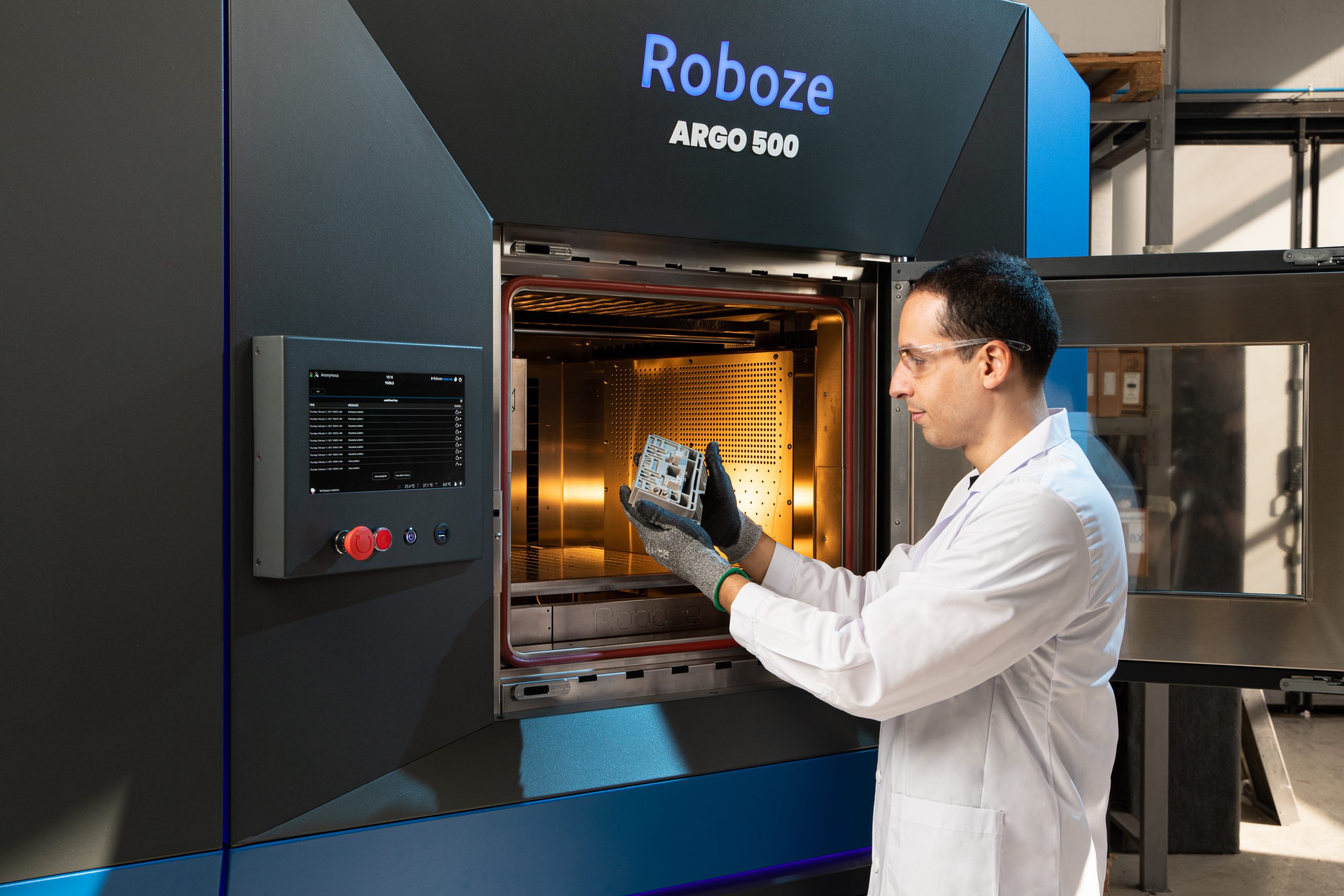 An engineer using ROBOZE's ARGO 500 3D printer.
