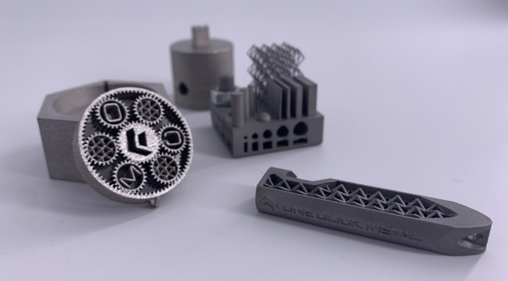 Metal parts 3D printed on the MPRINT+. Photo via One Click Metal.