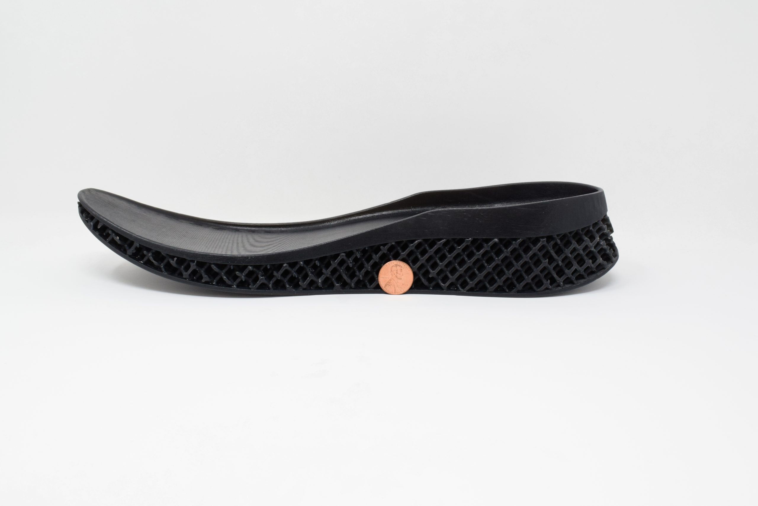 A full-size 3D printed shoe midsole. Photo via Adaptive3D.