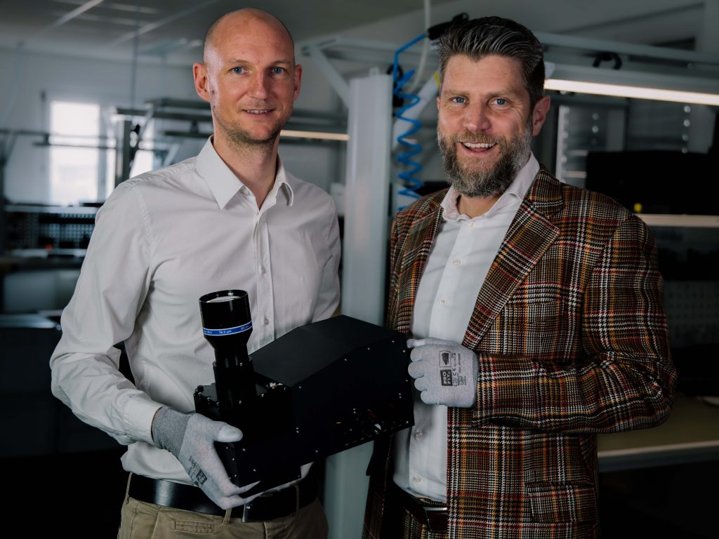 Christof Hieger (CTO) and Florian Zangerl (CEO) holding Phoenix. Photo via In-Vision.