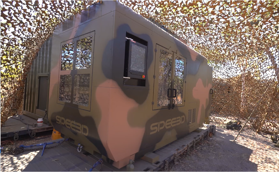 A camo-colored version of SPEE3D's WARPSPEE3D 3D printer.