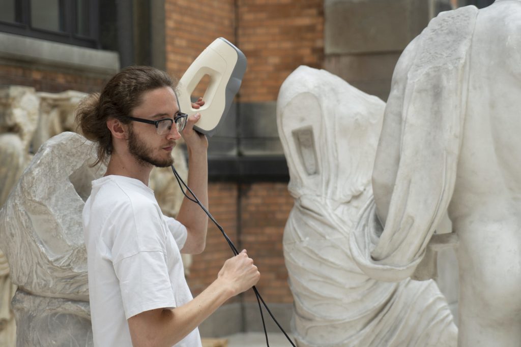 Jon Beck of Scan the World uses 3D scanning technology to capture artwork from around the world, which is then scanned and optimized for 3D printing.  Photo via SMK Museum.