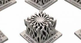A Seurat Technologies metal 3D printed part.