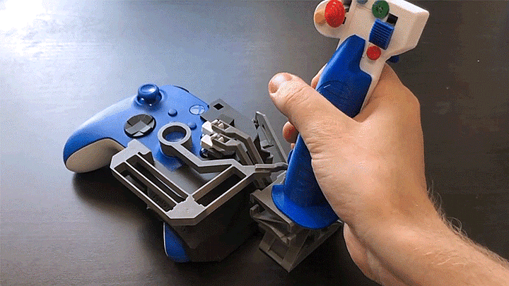 The 3D printed joystick attachment. Photo via Akaki Kuumeri.