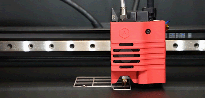 A gif of the extruder on Raise3D's E2CF 3D printer being calibrated. 