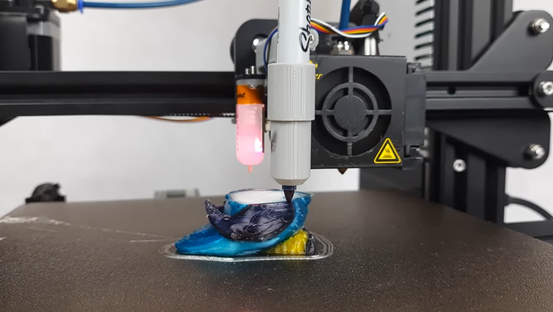 This opensource multicolor 3D printing addon can be built for less